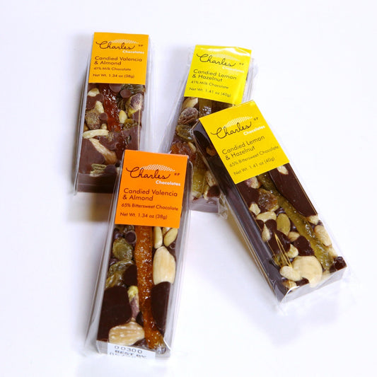 Mendiant bars from Charles Chocolates topped with dried fruits and roasted nuts.