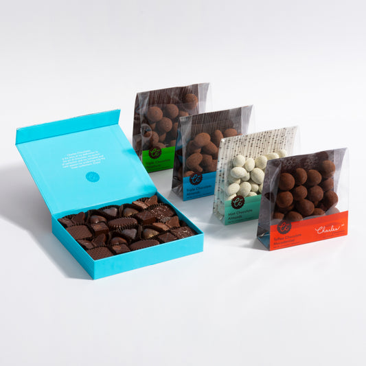 Charles Chocolates Starter Pack, open signature box with four chocolate covered nut bags