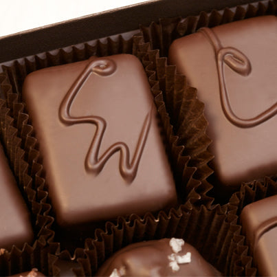 Close up of handmade Charles Chocolates pieces in a box
