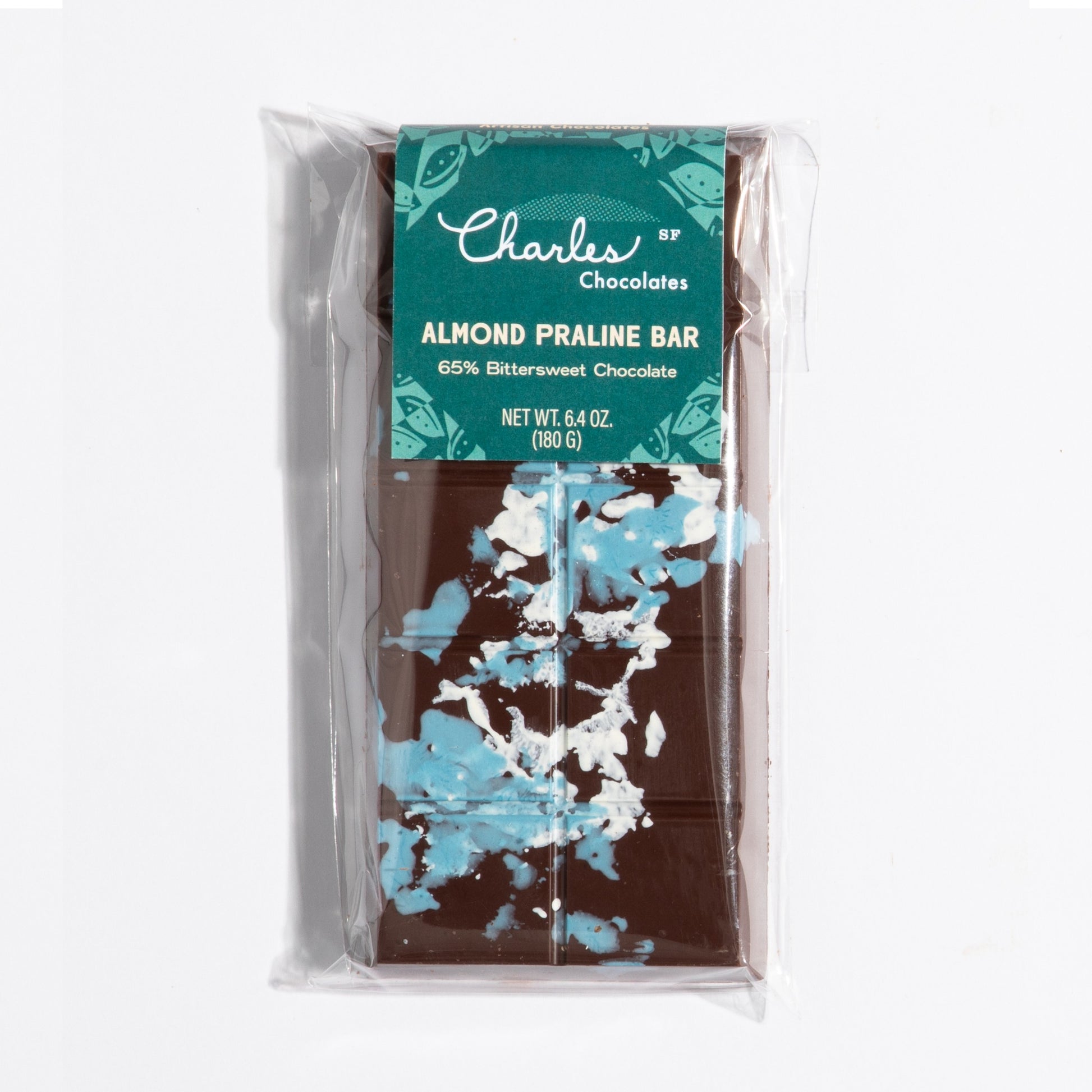 Almond French Praline Crunch Bar in its teal botanical wrapper by Charles Chocolates